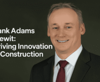 Hank Adams of Kiewit in a professional headshot, showcasing leadership in construction innovation